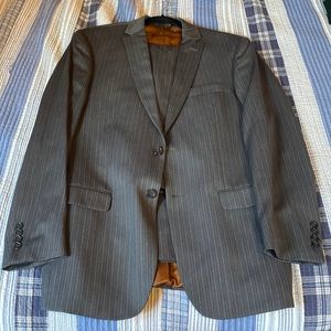 Great condition barely worn Suit jacket and pants